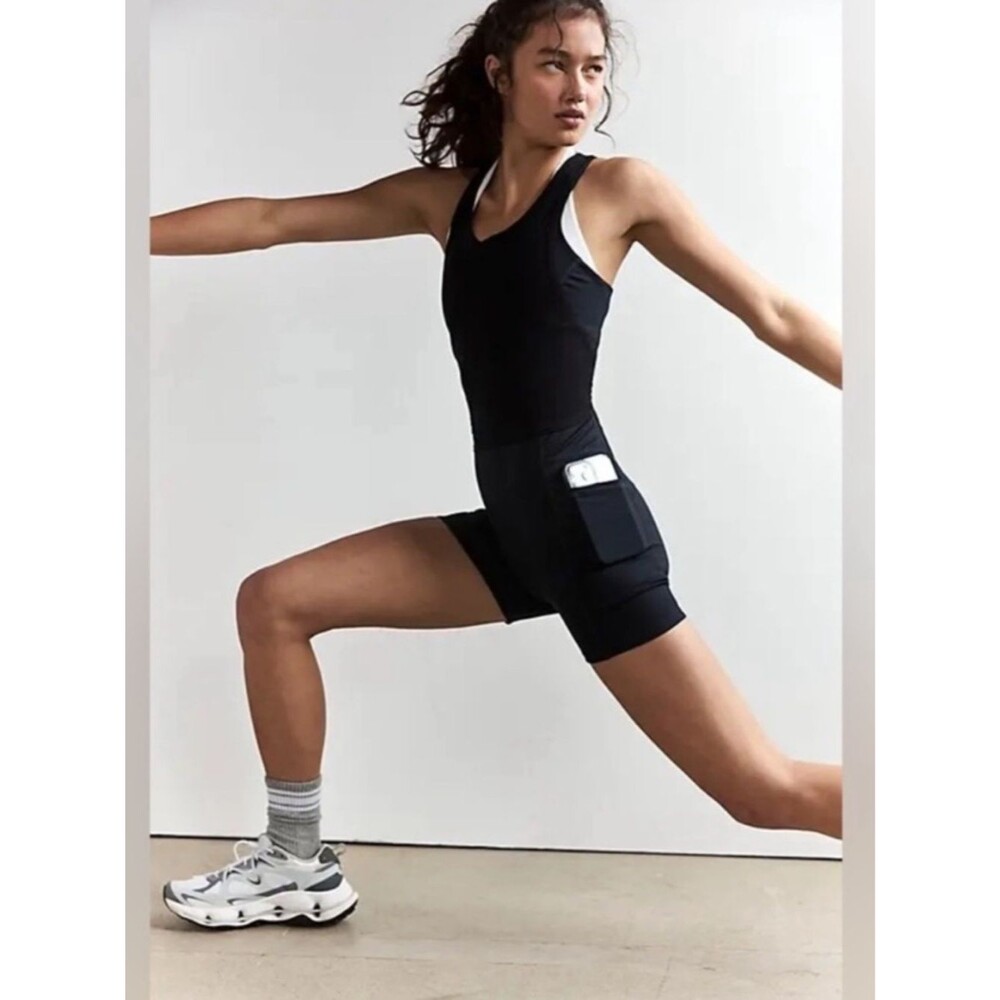 Free People FP movement front runner runsie black sz M NWOT
